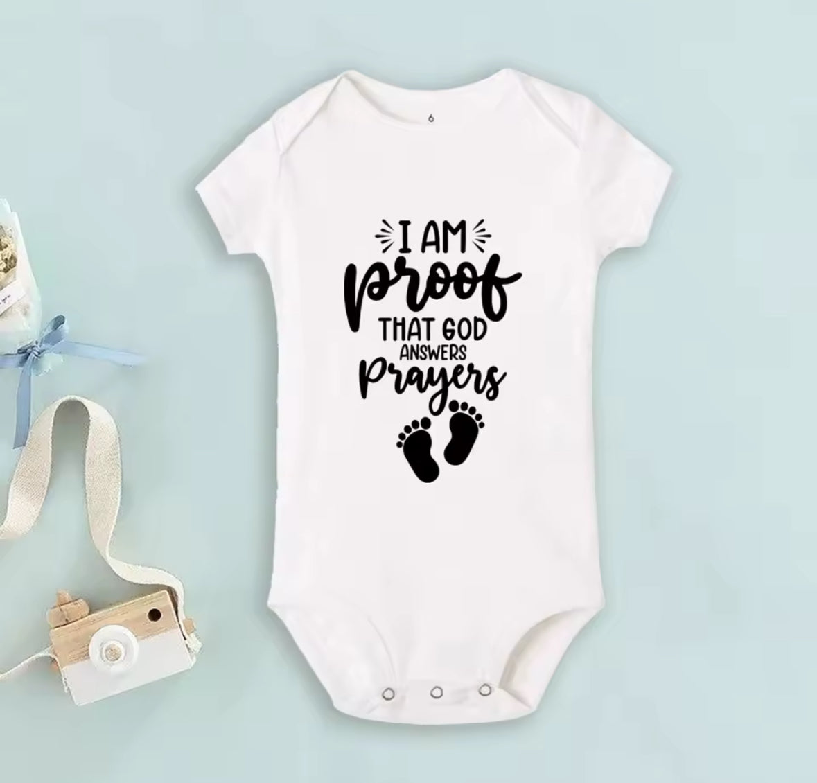 I am proof that God answers prayers baby vest